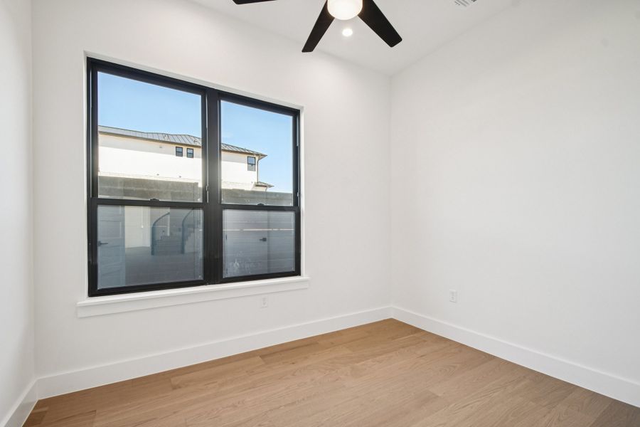 Spacious, unfurnished interior of a new home in Milky Way at River Place, Austin (Image 19).