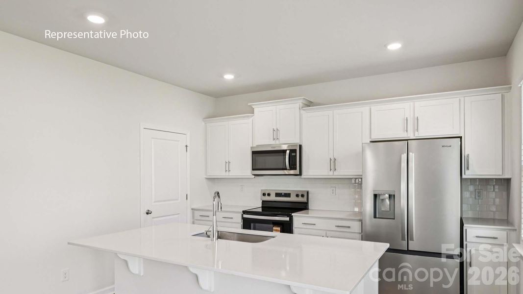 Furnished interior view inside a new home in Secrest Commons, Monroe (Image 3).