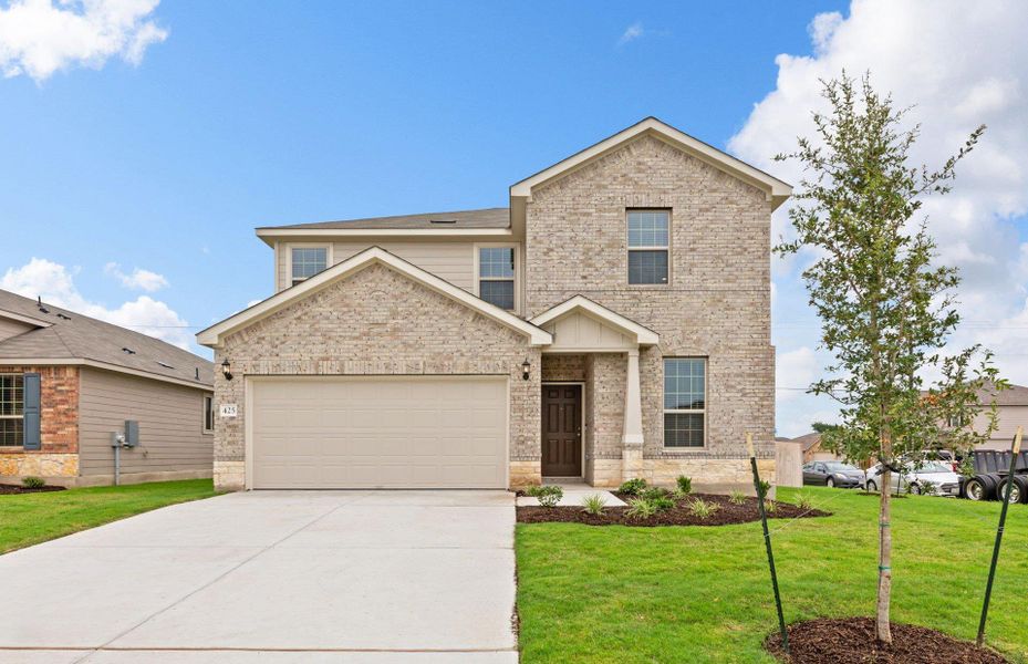 Front exterior of a new home in Sonterra, Jarrell, TX, highlighting curb appeal (Image 15). Front exterior of a new home in Sonterra, Jarrell, TX, highlighting curb appeal (Image 15).
