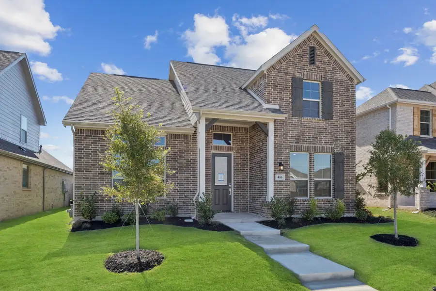 Front exterior of a new home in Dove Hollow, Waxahachie, TX, highlighting curb appeal (Image 2). Front exterior of a new home in Dove Hollow, Waxahachie, TX, highlighting curb appeal (Image 2).