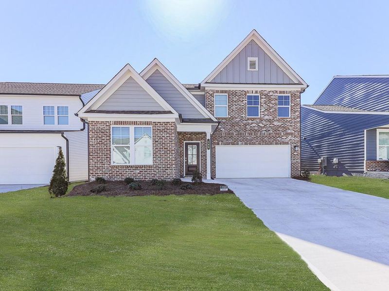 Front exterior of a new home in Kingsley, Acworth, GA, highlighting curb appeal (Image 27).