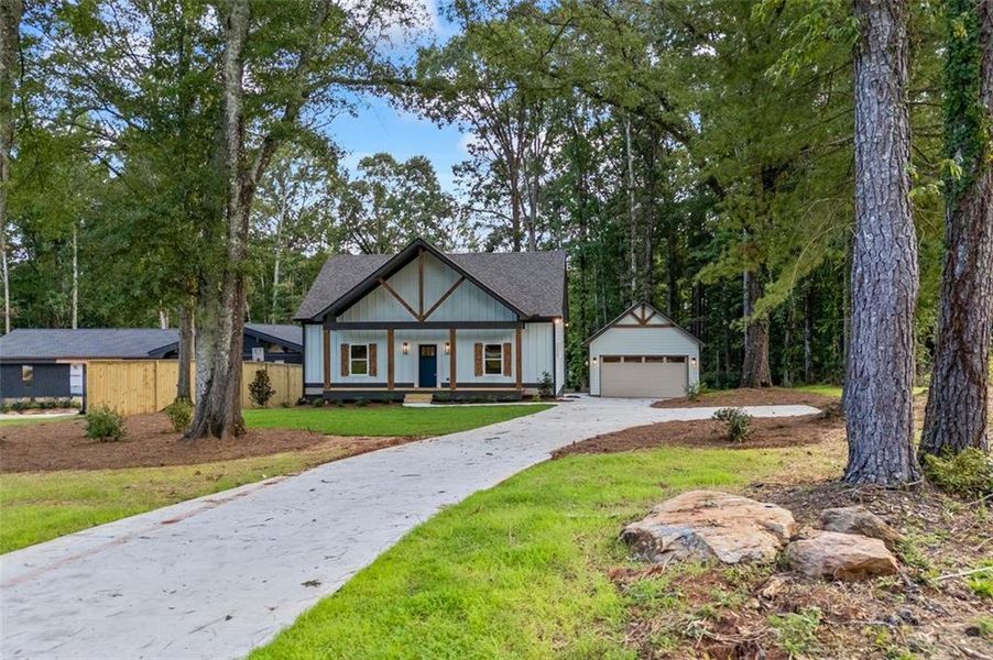 Front exterior of a new home in , Monroe, GA, highlighting curb appeal (Image 30).