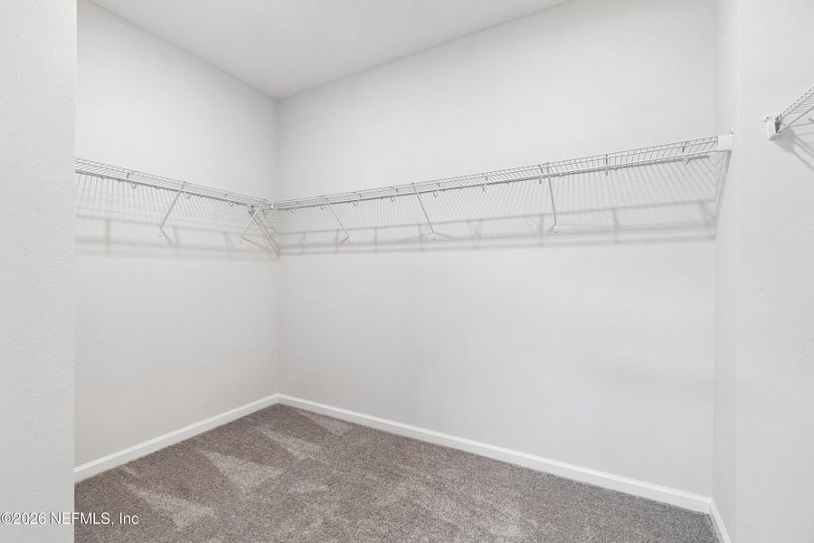 Spacious, unfurnished interior of a new home in Tributary 50', Yulee (Image 21).