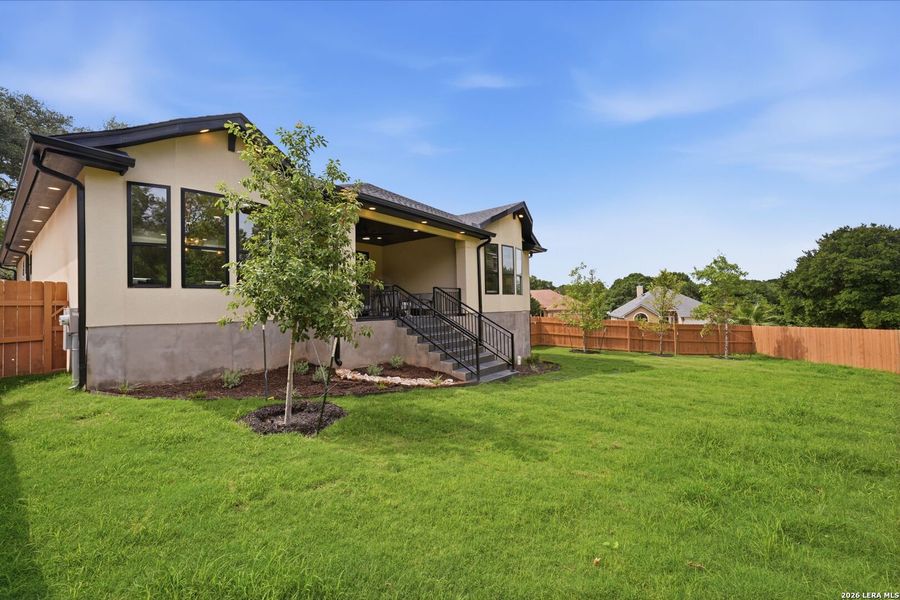 Exterior details and patio area of a home in , San Antonio (Image 27).