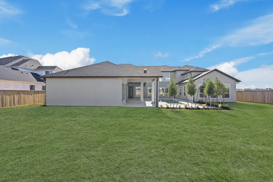 Exterior details and patio area of a home in Bridgeland, Cypress (Image 3).