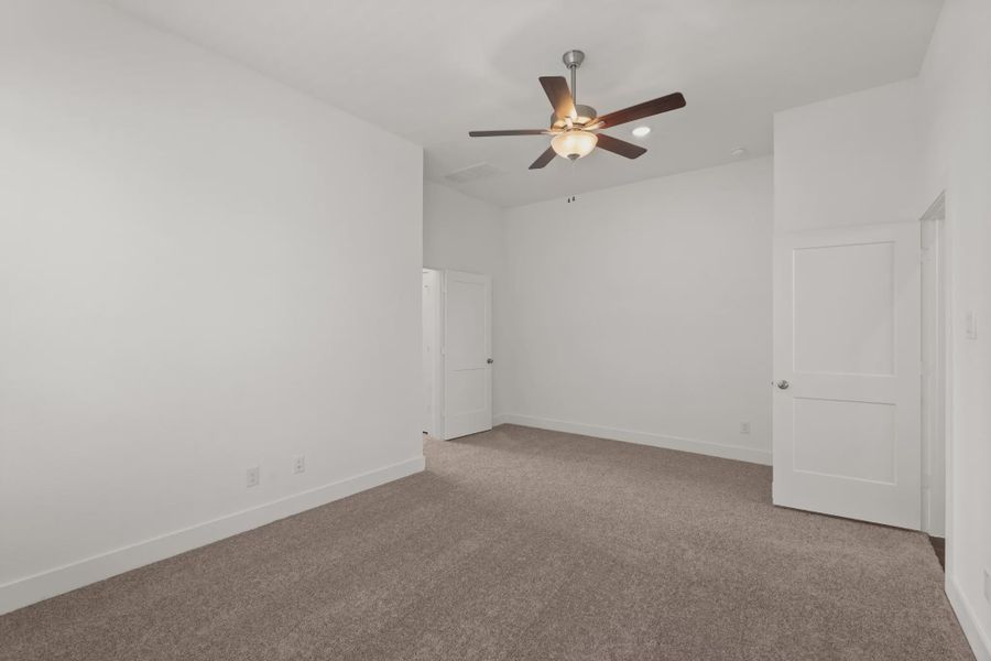 Representative unfurnished interior of a home built from the Cheverny by Chesmar Homes in Sienna Chateau, Missouri City (Image 27).