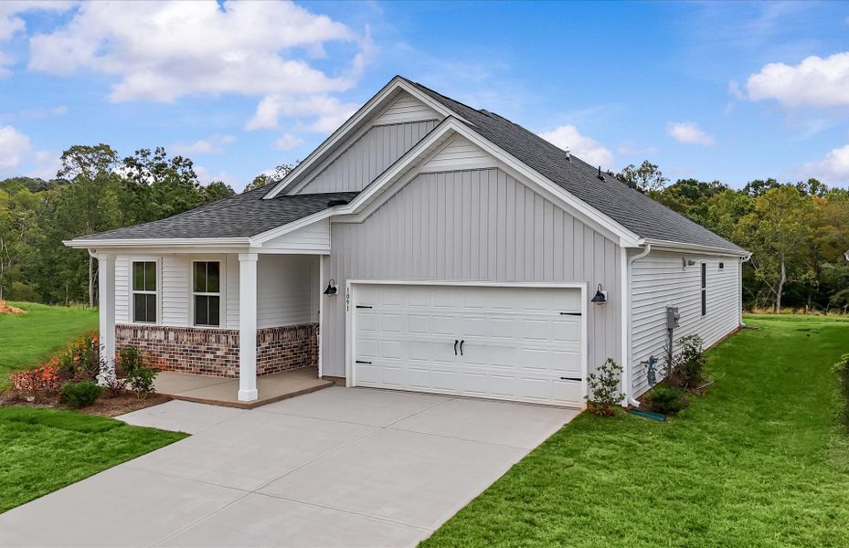 Front exterior of a new home in Sweetwater Hills, Moore, SC, highlighting curb appeal (Image 1). Front exterior of a new home in Sweetwater Hills, Moore, SC, highlighting curb appeal (Image 1).