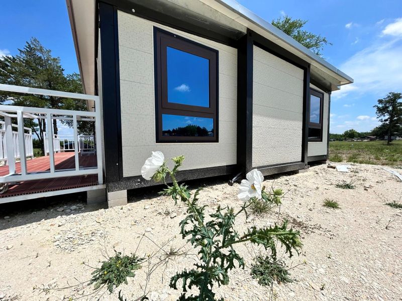 Exterior details and patio area of a home in , Mexia (Image 6). Exterior details and patio area of a home in , Mexia (Image 6).