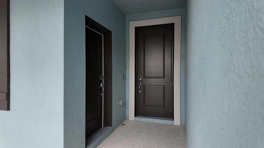 Exterior details and patio area of a home in Cascades: Grand Collection, Davenport (Image 3).