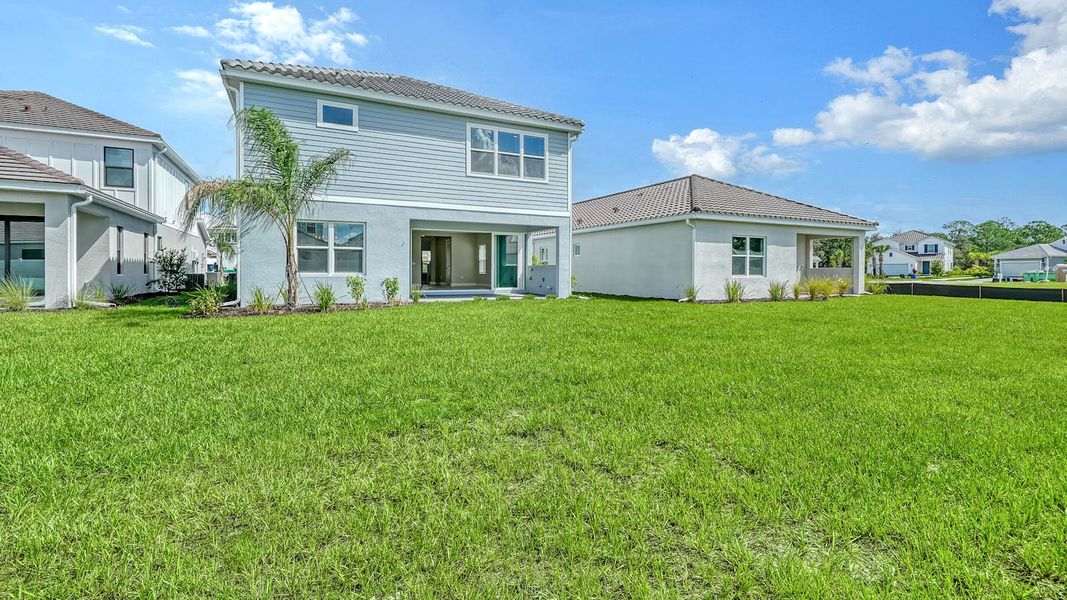 Exterior details and patio area of a home in Windward Real Estate and Homes for Sale in Sarasota, FL - Neal Communities, Lakewood Ranch (Image 21).