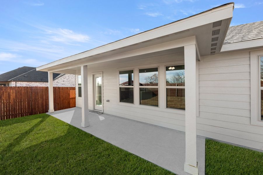 Front exterior of a new home in Belmont, Aubrey, TX, highlighting curb appeal (Image 28). Front exterior of a new home in Belmont, Aubrey, TX, highlighting curb appeal (Image 28).