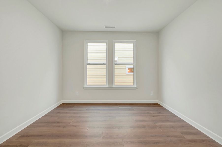 Spacious, unfurnished interior of a new home in Altis At Serenity | A 55+ Community, Fuquay Varina (Image 19). Spacious, unfurnished interior of a new home in Altis At Serenity | A 55+ Community, Fuquay Varina (Image 19).