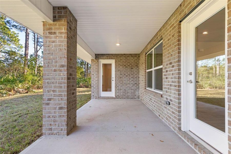 Exterior details and patio area of a home in , Palm Coast (Image 2). Exterior details and patio area of a home in , Palm Coast (Image 2).