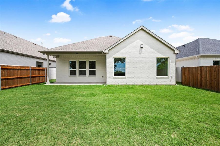 Front exterior of a new home in Parks of Aledo, Aledo, TX, highlighting curb appeal (Image 24). Front exterior of a new home in Parks of Aledo, Aledo, TX, highlighting curb appeal (Image 24).