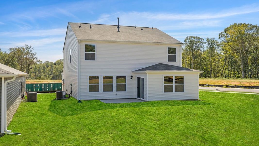 Exterior details and patio area of a home in Village Grove, Greenville (Image 3). Exterior details and patio area of a home in Village Grove, Greenville (Image 3).