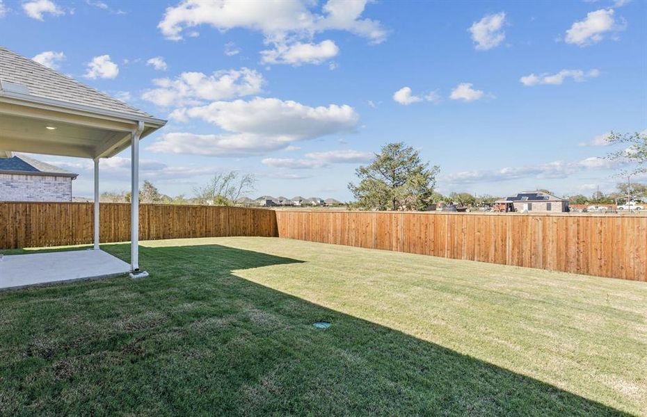 Spacious, fenced-in backyard Spacious, fenced-in backyard