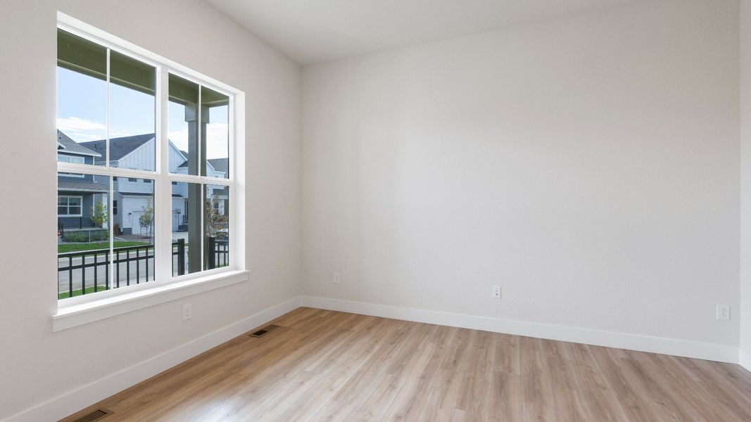 Furnished interior view inside a new home in Dillon Pointe - Journey, Broomfield (Image 6).