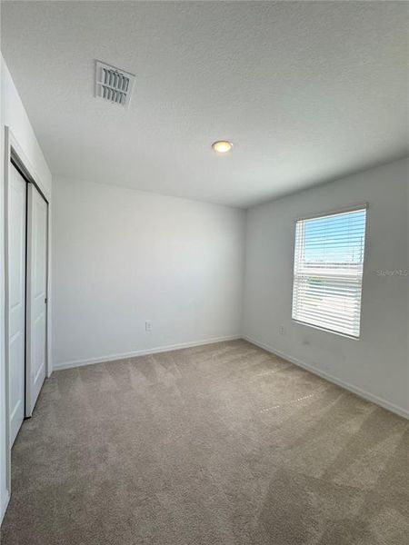 Spacious, unfurnished interior of a new home in Marion Creek, Haines City (Image 25).