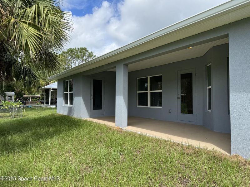 Exterior details and patio area of a home in Sebastian Highlands, Sebastian (Image 2).