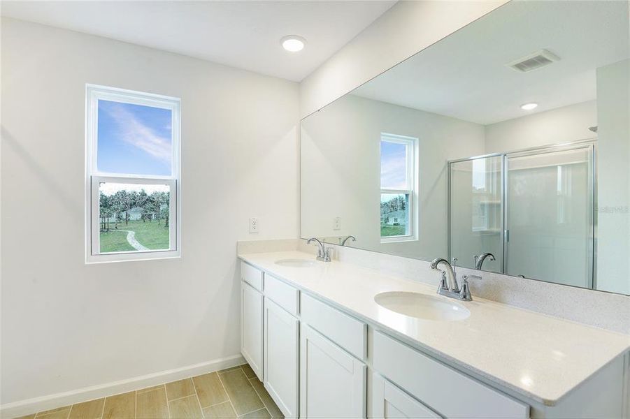 Furnished interior view inside a new home in Seasons at Grandview Gardens, Deland (Image 8). Furnished interior view inside a new home in Seasons at Grandview Gardens, Deland (Image 8).