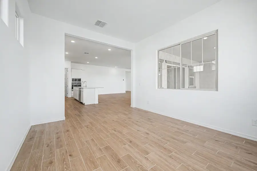 Spacious, unfurnished interior of a new home in Empire Pointe, Queen Creek (Image 9).