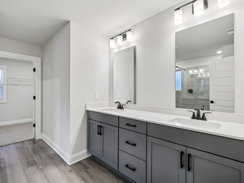 Furnished interior view inside a new home in Vines at Mill Creek - Estate Series, Braselton (Image 9).