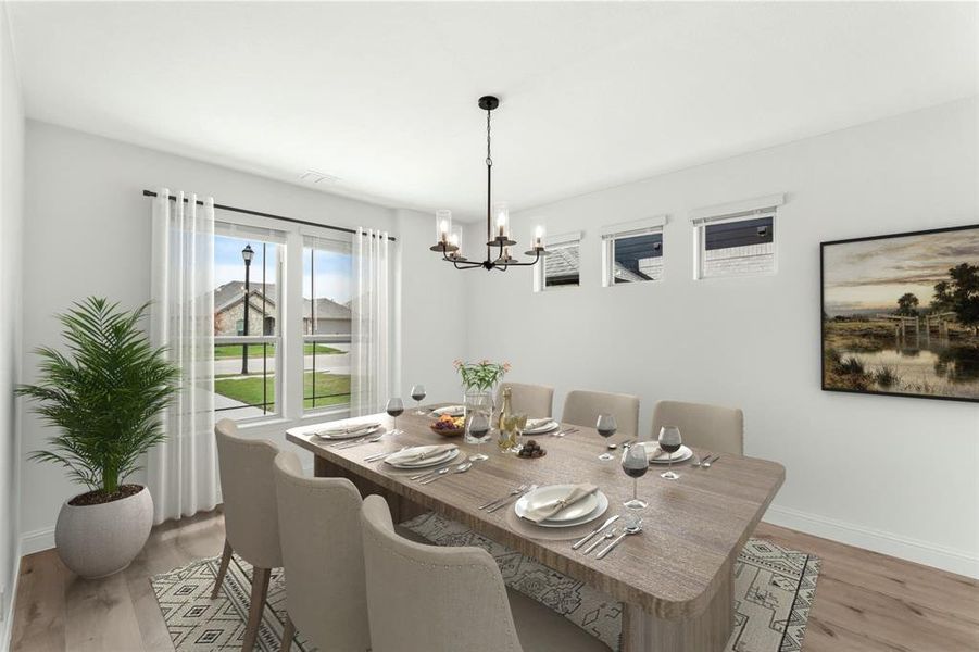Formal Dining Area located just off the front entry offers so much in detail. Notice the 3 windows to allow for privacy from the neighbors will letting in an abundance of natural light.