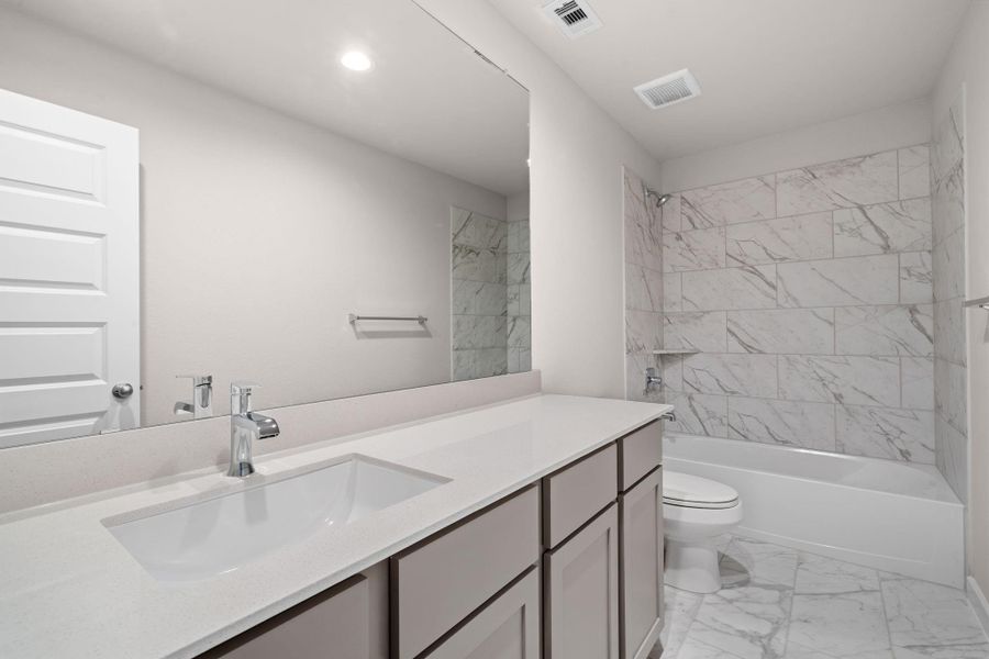 Furnished interior view inside a new home in Sunterra Lakes, Fulshear (Image 13).