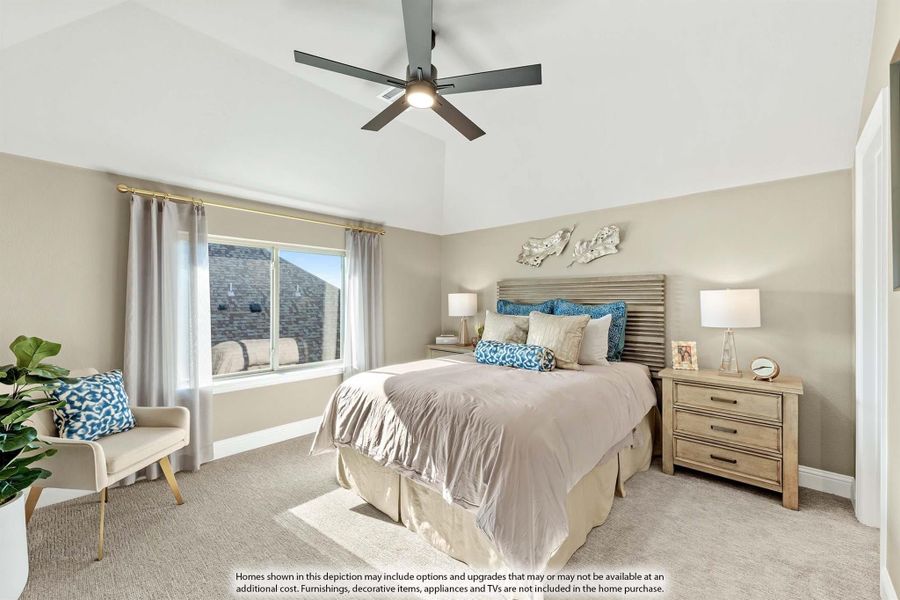 Bedroom with vaulted ceiling, ceiling fan, carpet flooring, and large window with natural light Bedroom with vaulted ceiling, ceiling fan, carpet flooring, and large window with natural light