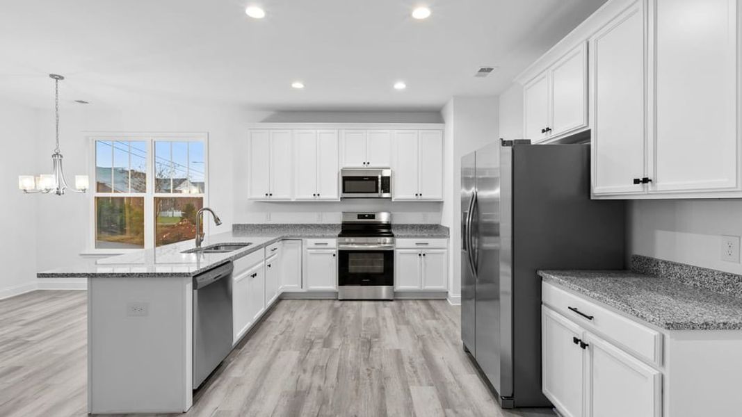 Representative furnished interior of a home built from the End Unit by D.R. Horton in Pearson Road Townhomes, Easley (Image 6).