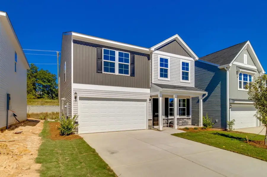 Front exterior of a new home in Bluefield, Lexington, SC, highlighting curb appeal (Image 21).