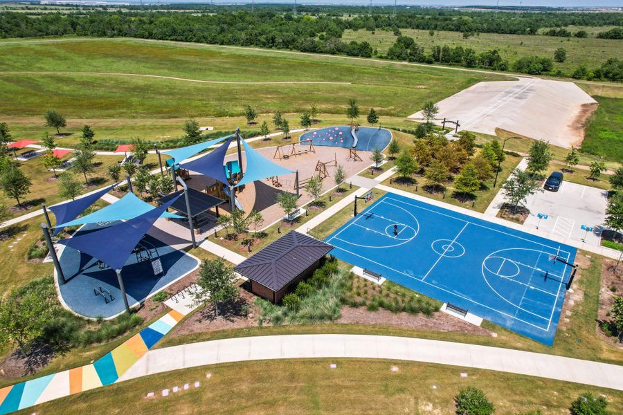 Full size basketball court, full outdoor workout equiment, canopied playgrounds.