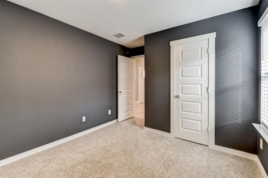 Spacious, unfurnished interior of a new home in Post Oak Pointe, Fresno (Image 13).