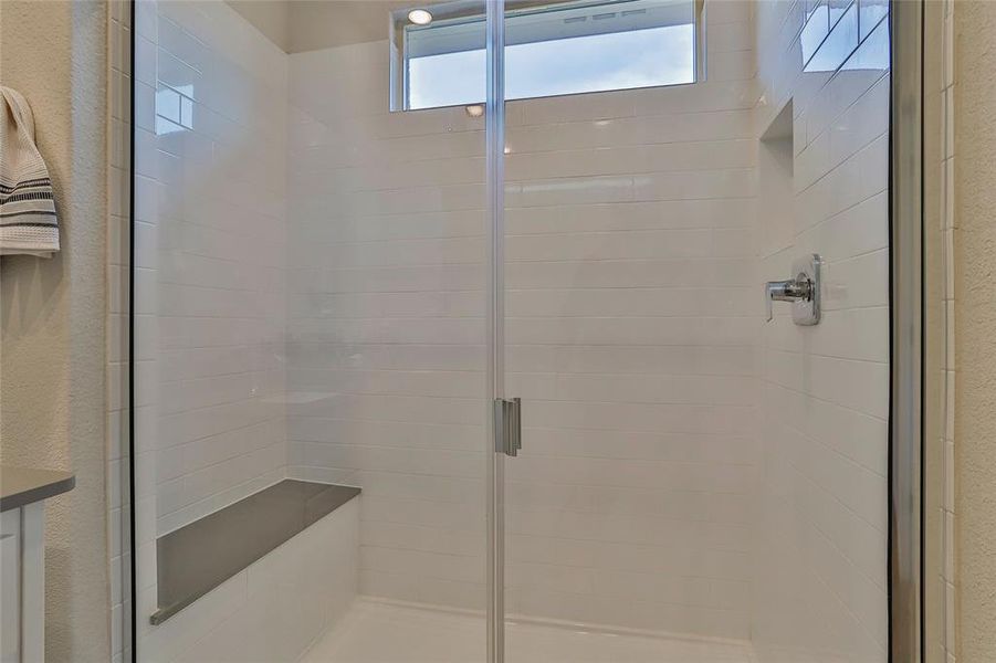 Full bathroom featuring a stall shower Full bathroom featuring a stall shower