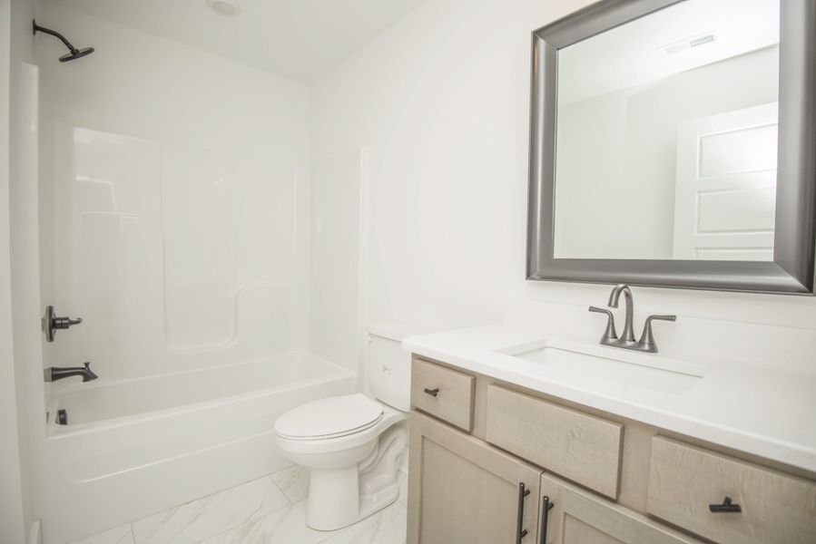 *Photo of example home. Selections and Finishes May Vary.*