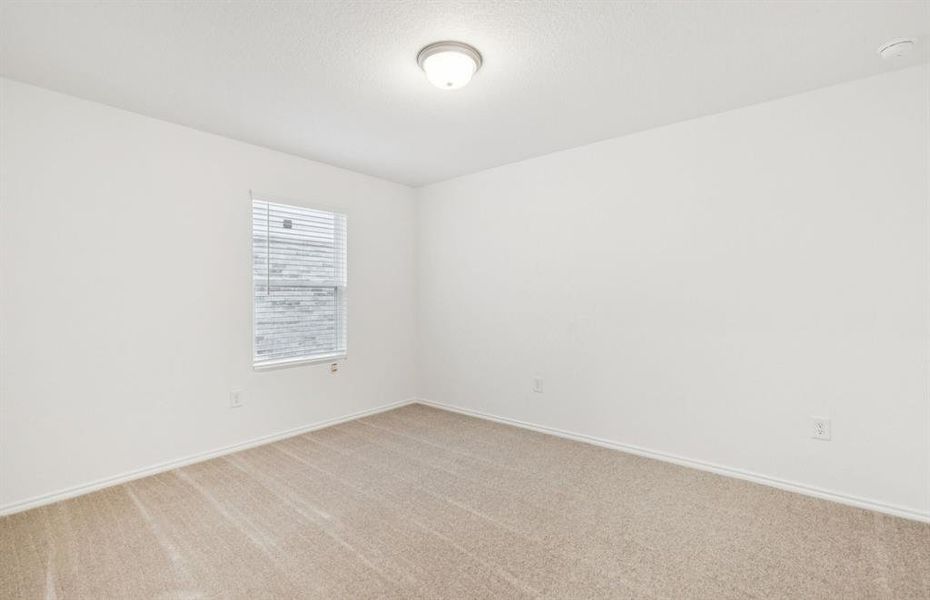 Inviting bedroom offering soft natural light Inviting bedroom offering soft natural light