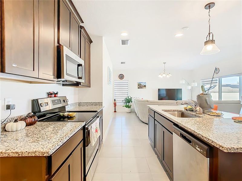 Furnished interior view inside a new home in Horse Creek at Crosswinds, Davenport (Image 13).