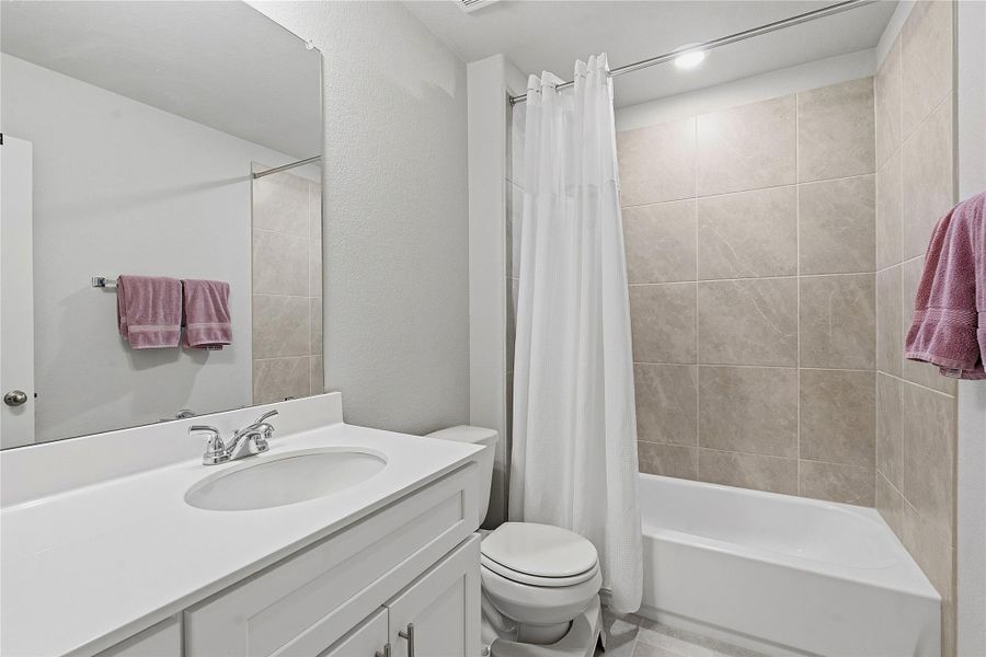 Furnished interior view inside a new home in Crosswinds, Kyle (Image 30).