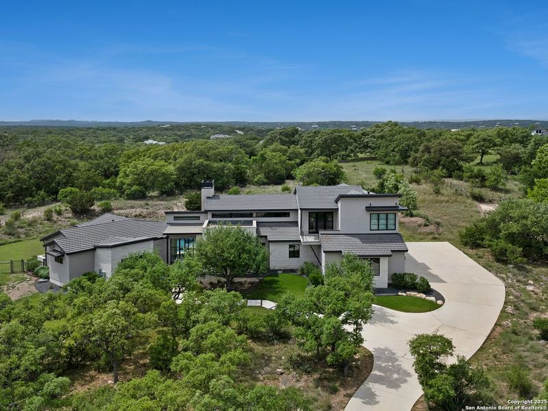 Front exterior of a new home in , Boerne, TX, highlighting curb appeal (Image 27).