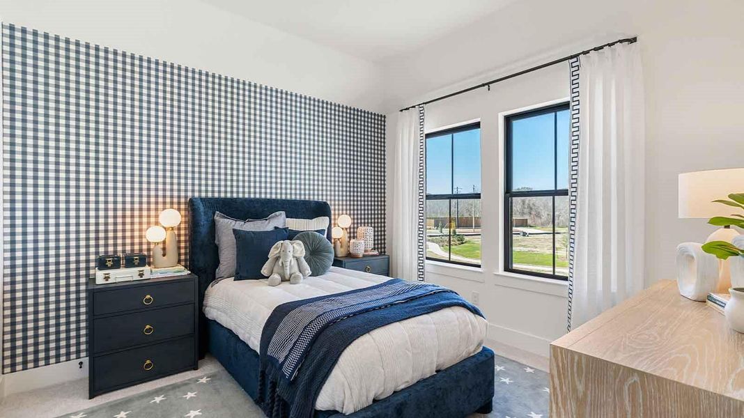 A fourth bedroom with one window, space that fits a queen size bed and additional bedroom furniture