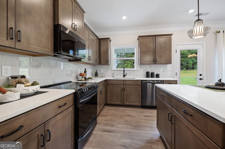 Furnished interior view inside a new home in Maddox Station, Eatonton (Image 11).