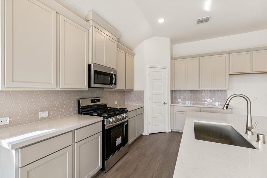 Furnished interior view inside a new home in Coastal Point, League City (Image 9).