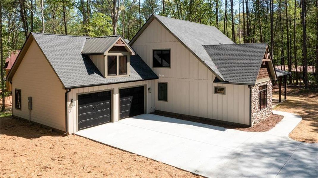 Front exterior of a new home in , Dawsonville, GA, highlighting curb appeal (Image 29). Front exterior of a new home in , Dawsonville, GA, highlighting curb appeal (Image 29).
