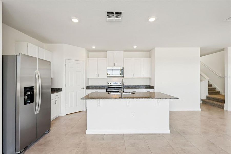 Furnished interior view inside a new home in , Poinciana (Image 7).