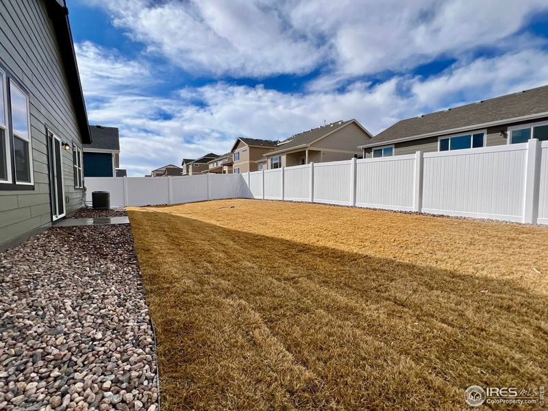 Exterior details and patio area of a home in Union Colony West, Greeley (Image 18).