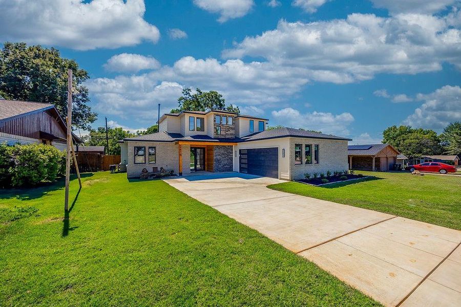 Front exterior of a new home in , Arlington, TX, highlighting curb appeal (Image 20). Front exterior of a new home in , Arlington, TX, highlighting curb appeal (Image 20).