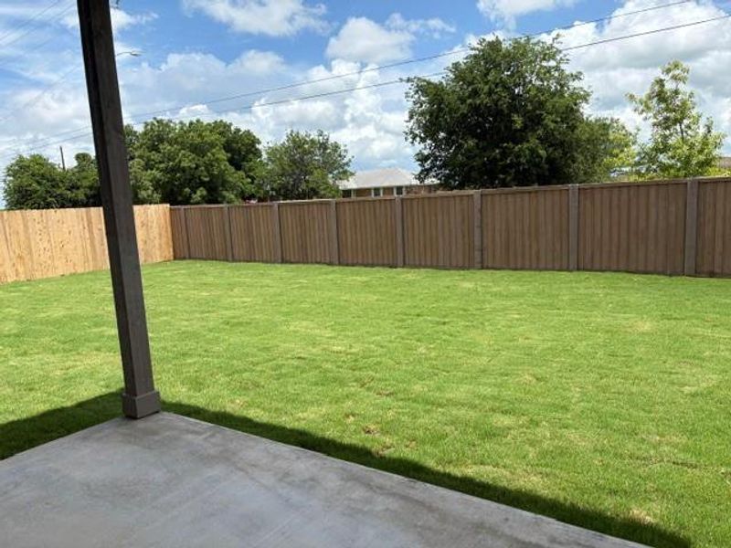 Exterior details and patio area of a home in Spring Creek, Taylor (Image 3).