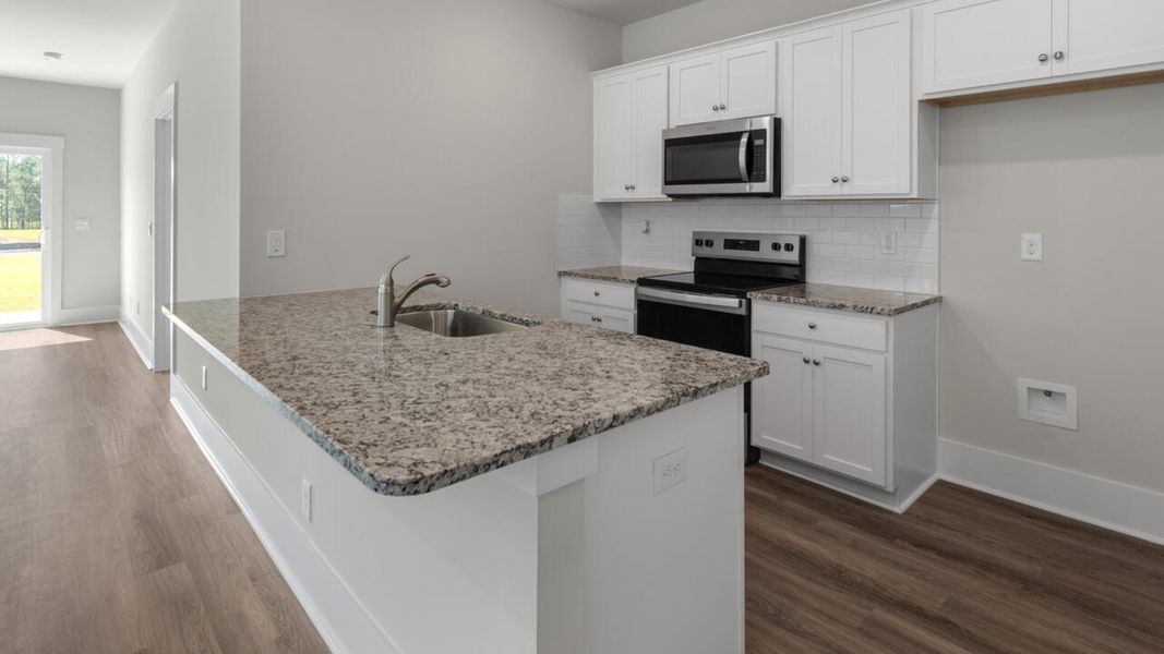 Furnished interior view inside a new home in Indigo Preserve Townhomes, Leland (Image 6).