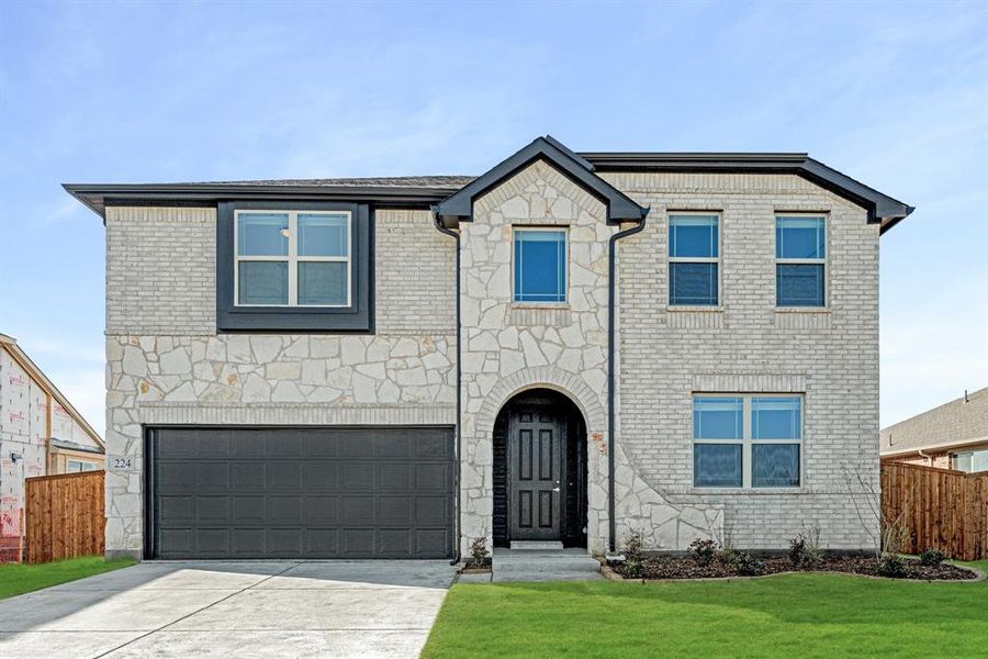 Front exterior of a new home in East Oak Creek Elements, Commerce, TX, highlighting curb appeal (Image 2).