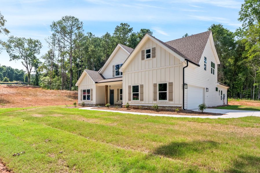 Front exterior of a new home in Hammett Woods, Hogansville, GA, highlighting curb appeal (Image 18).